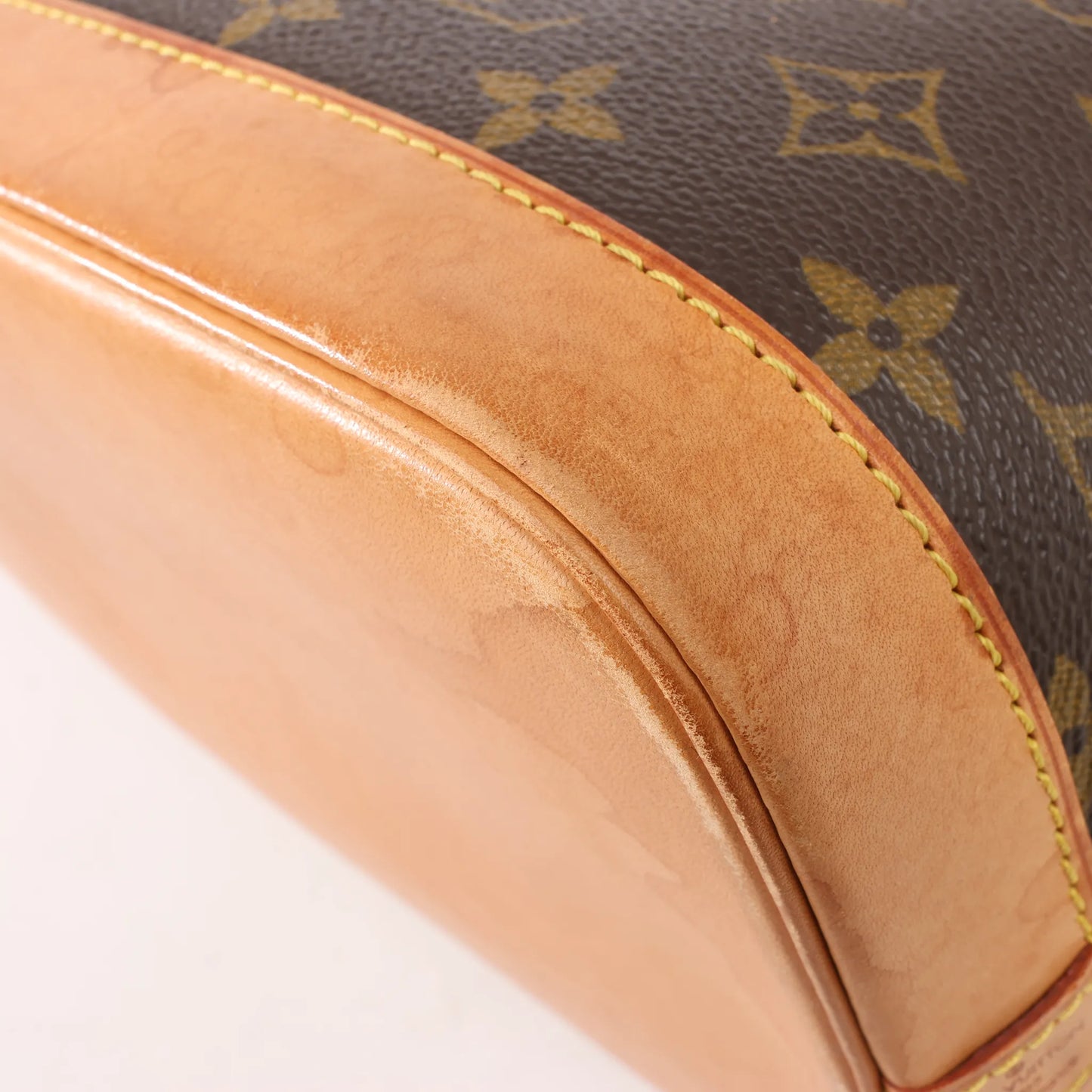 Louis Vuitton Monogram Canvas Alma PM Handbag in Brown M51130