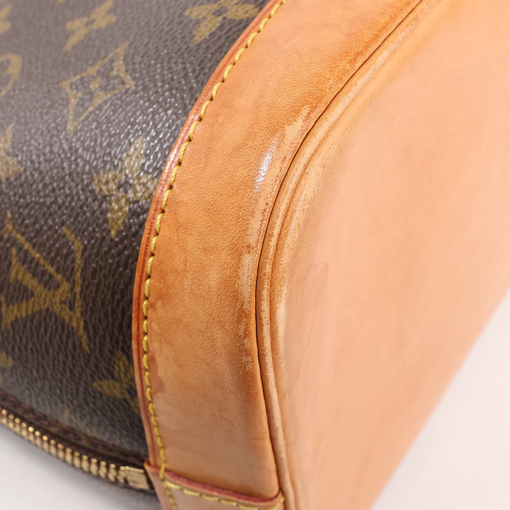 Louis Vuitton Monogram Canvas Alma PM Handbag in Brown M51130