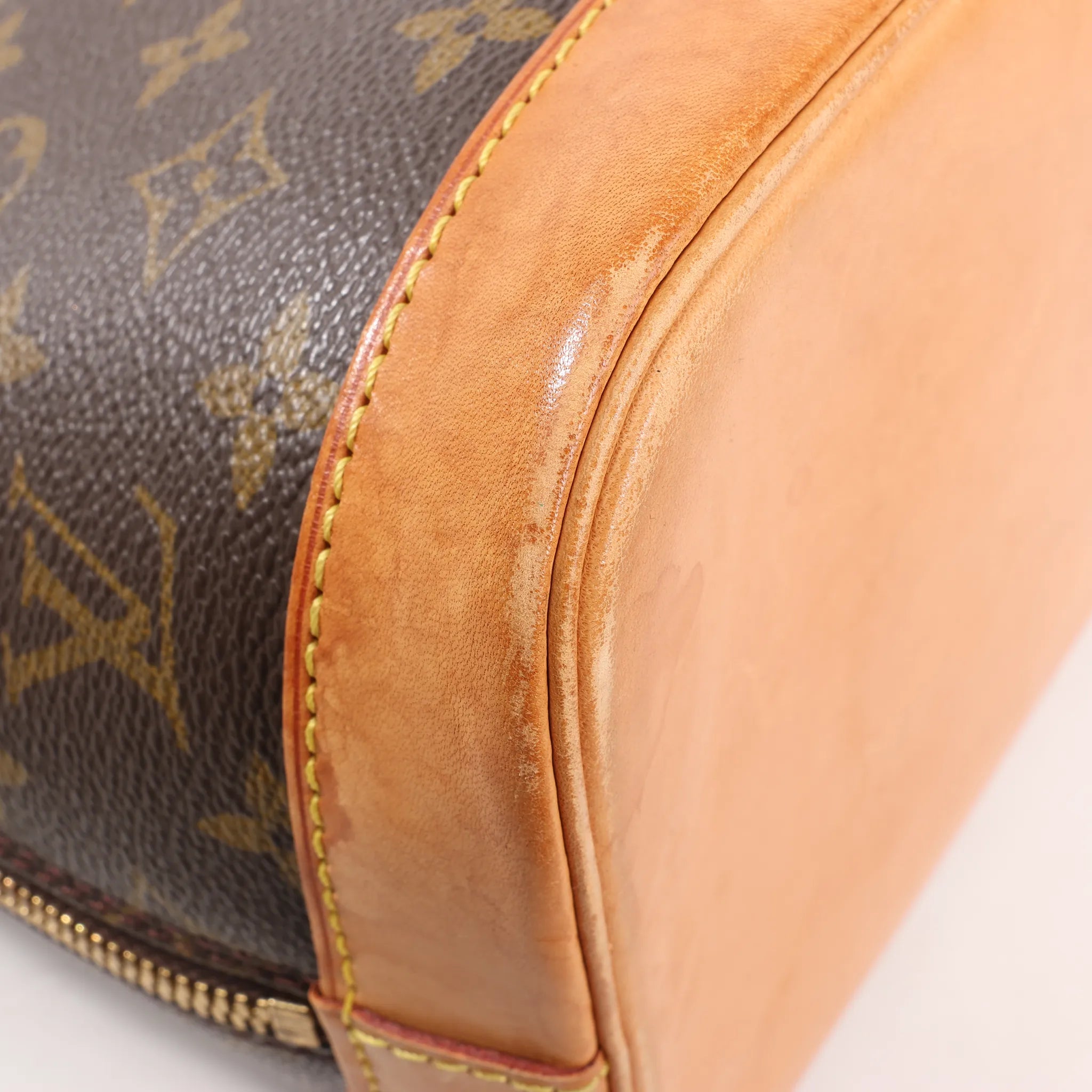 Louis Vuitton Monogram Canvas Alma PM Handbag in Brown M51130