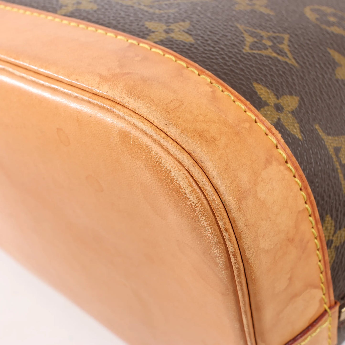 Louis Vuitton Monogram Canvas Alma PM Handbag in Brown M51130