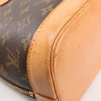Louis Vuitton Monogram Canvas Alma PM Handbag in Brown M51130