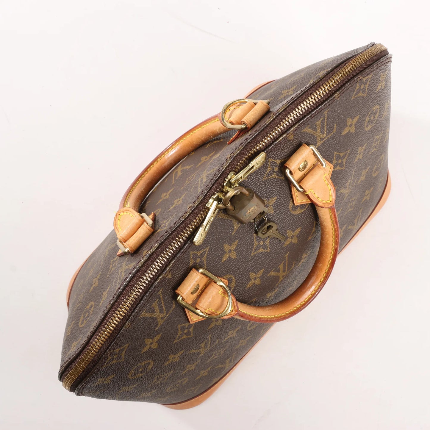 Louis Vuitton Monogram Canvas Alma PM Handbag in Brown M51130