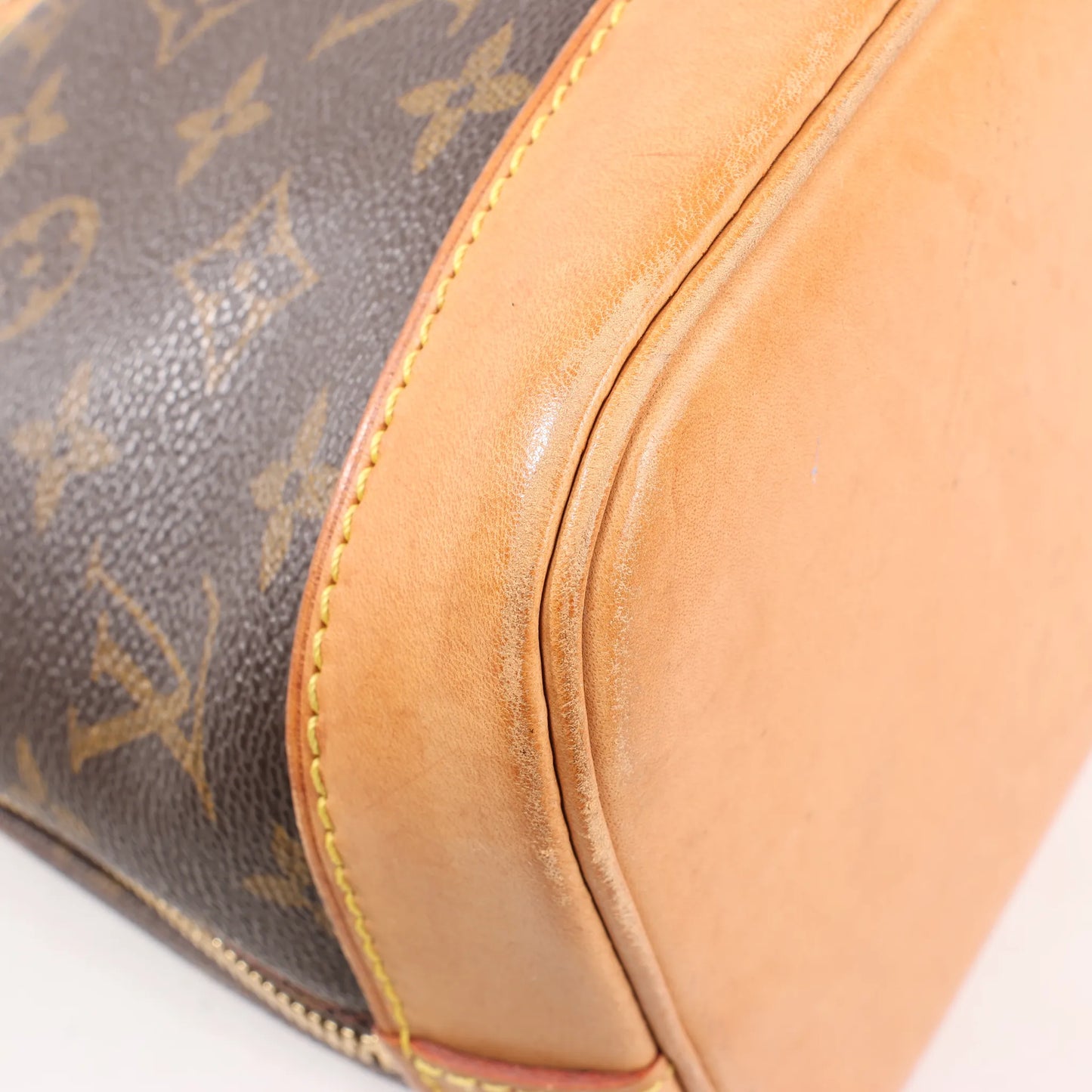 Louis Vuitton Monogram Canvas Alma PM Handbag in Brown M51130