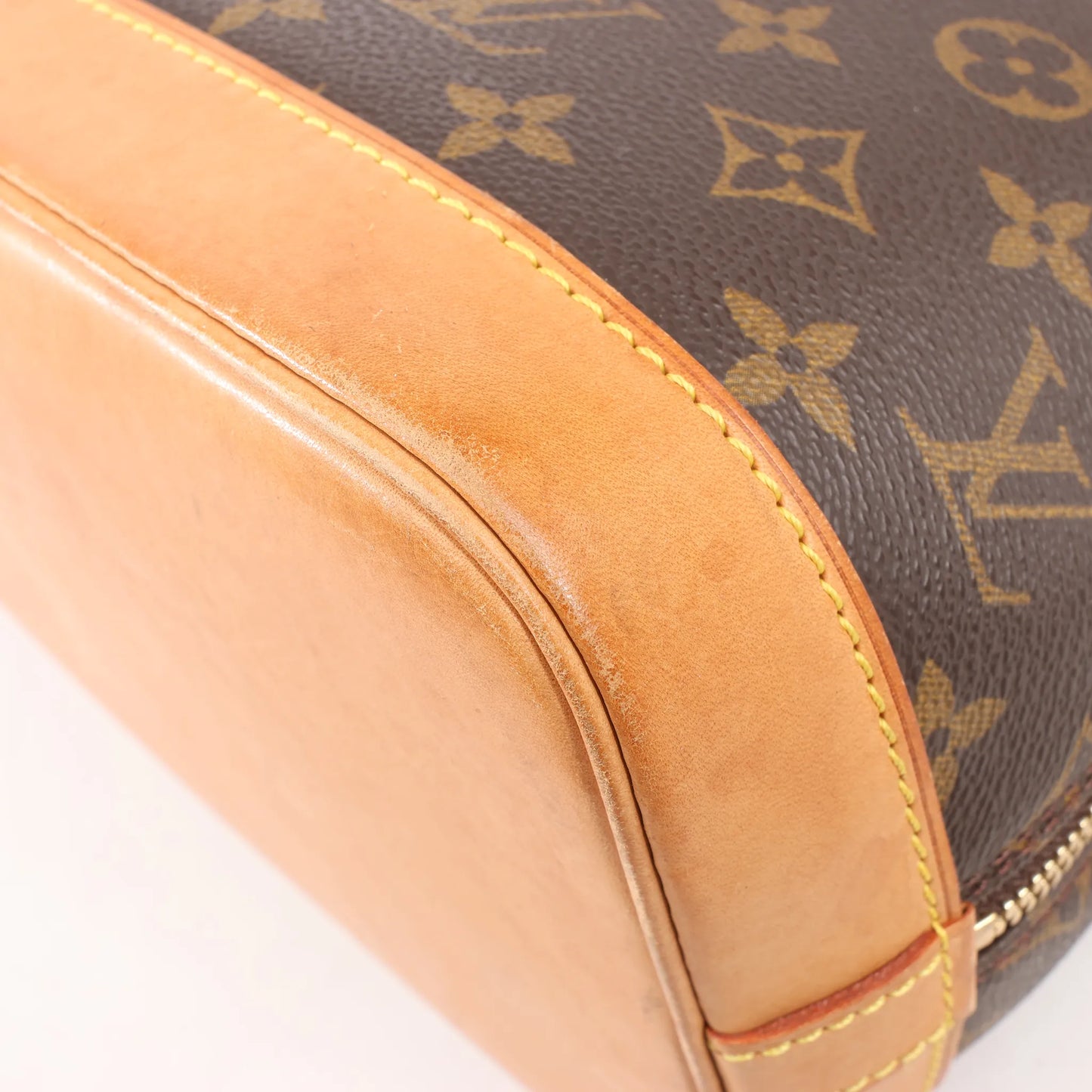 Louis Vuitton Monogram Canvas Alma PM Handbag in Brown M51130