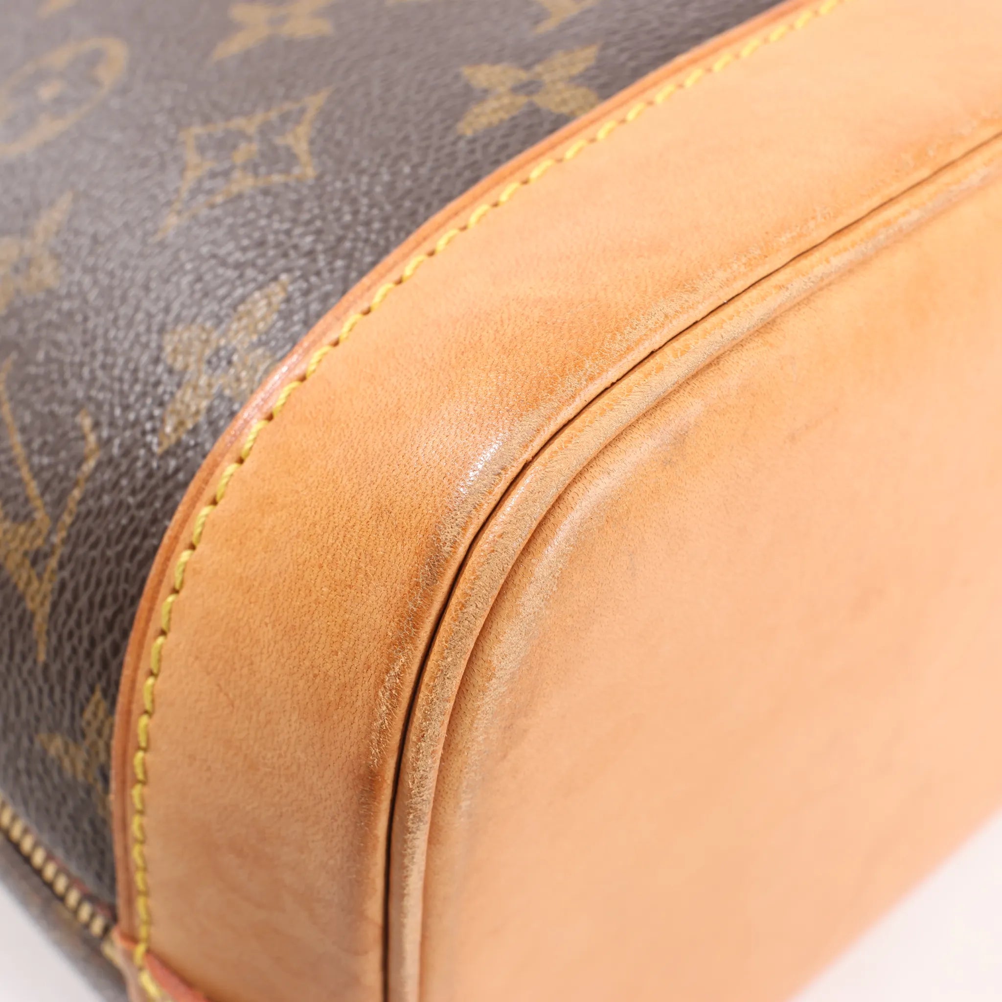 Louis Vuitton Monogram Canvas Alma PM Handbag in Brown M51130