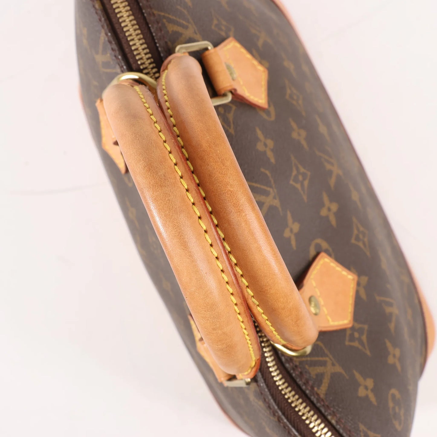 Louis Vuitton Monogram Canvas Alma PM Handbag in Brown M51130