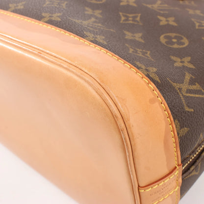 Louis Vuitton Monogram Canvas Alma PM Handbag in Brown M51130