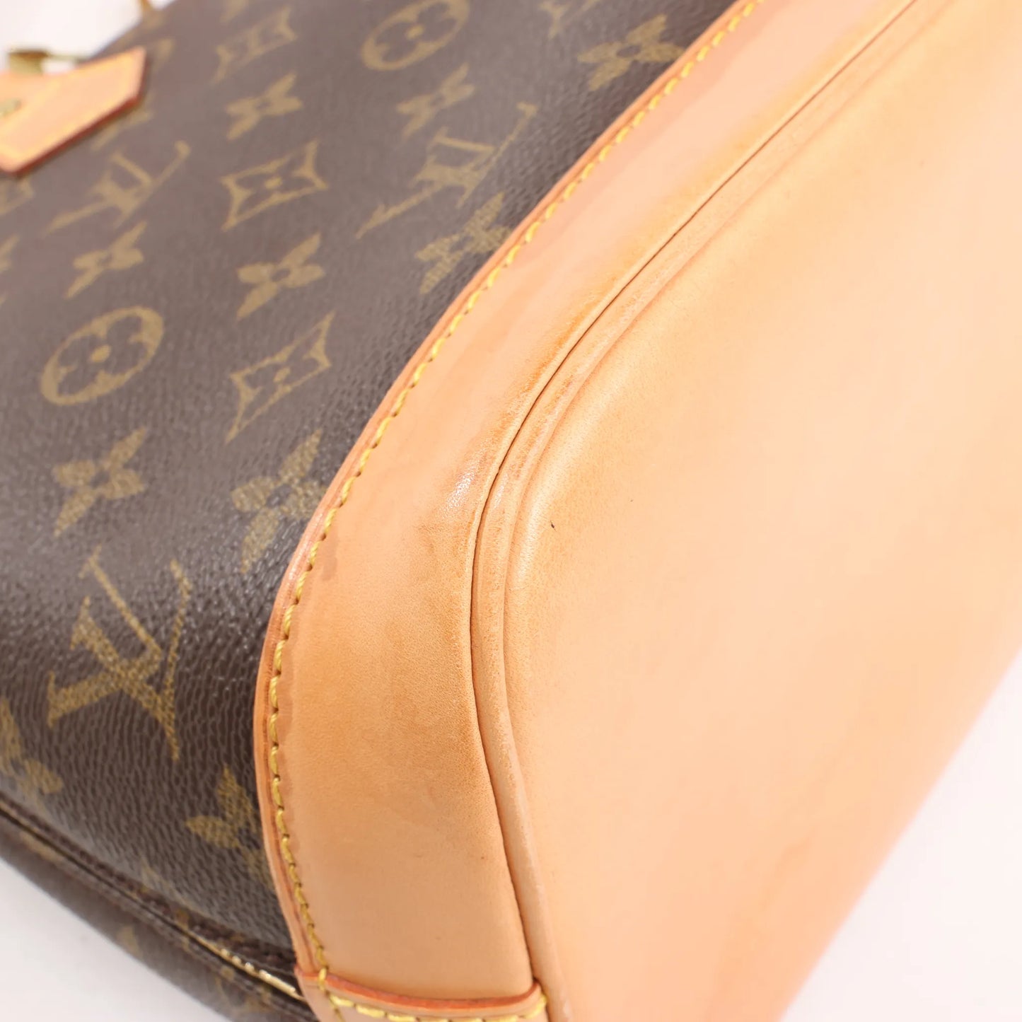 Louis Vuitton Monogram Canvas Alma PM Handbag in Brown M51130