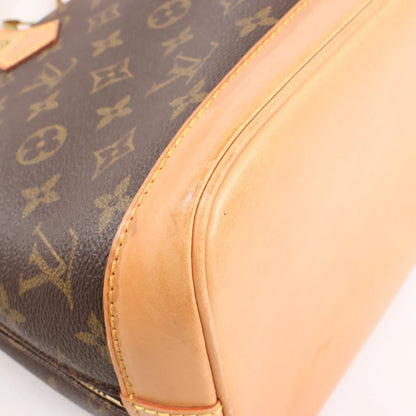 Louis Vuitton Monogram Canvas Alma PM Handbag in Brown M51130