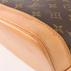 Louis Vuitton Monogram Canvas Alma PM Handbag in Brown M51130