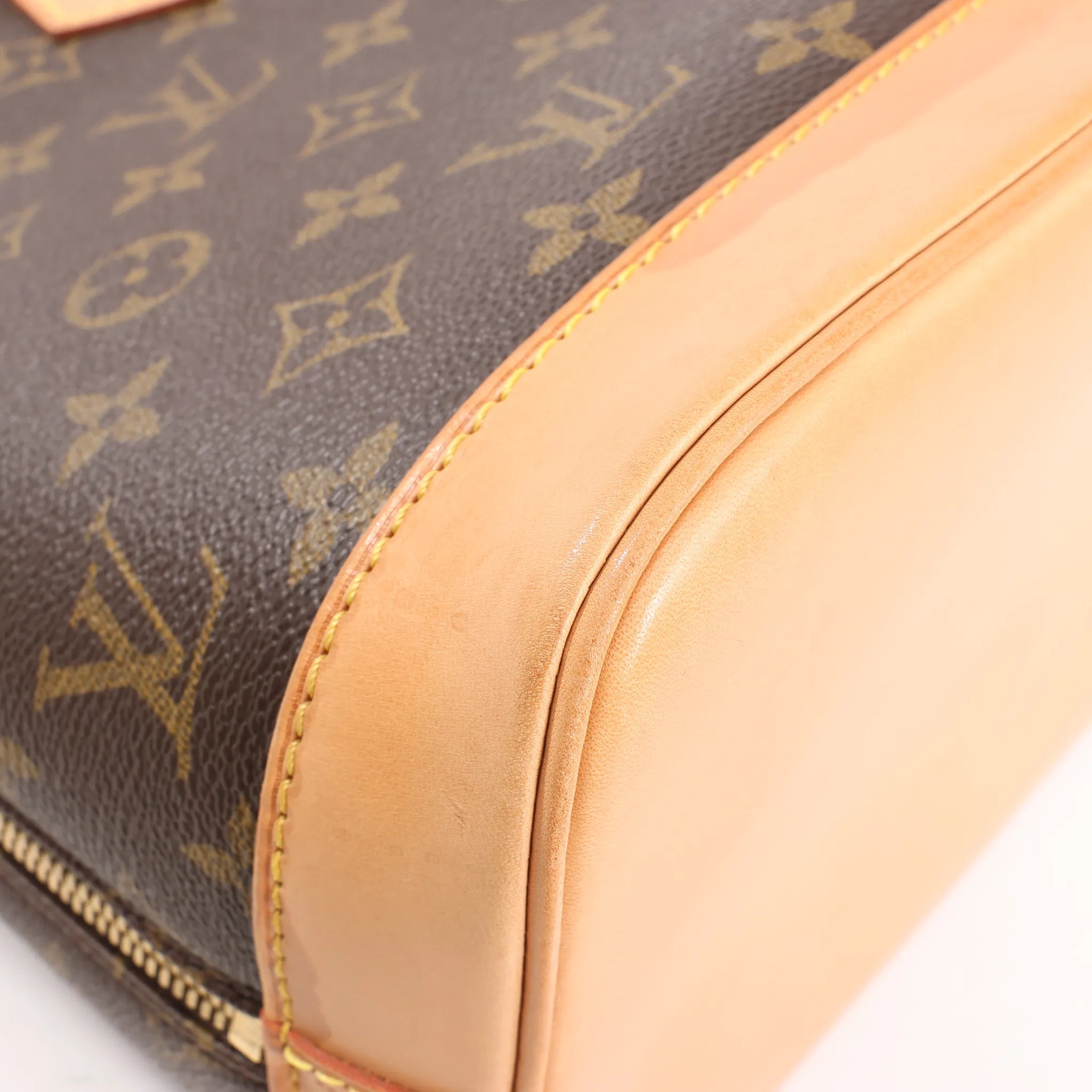 Louis Vuitton Monogram Canvas Alma PM Handbag in Brown M51130