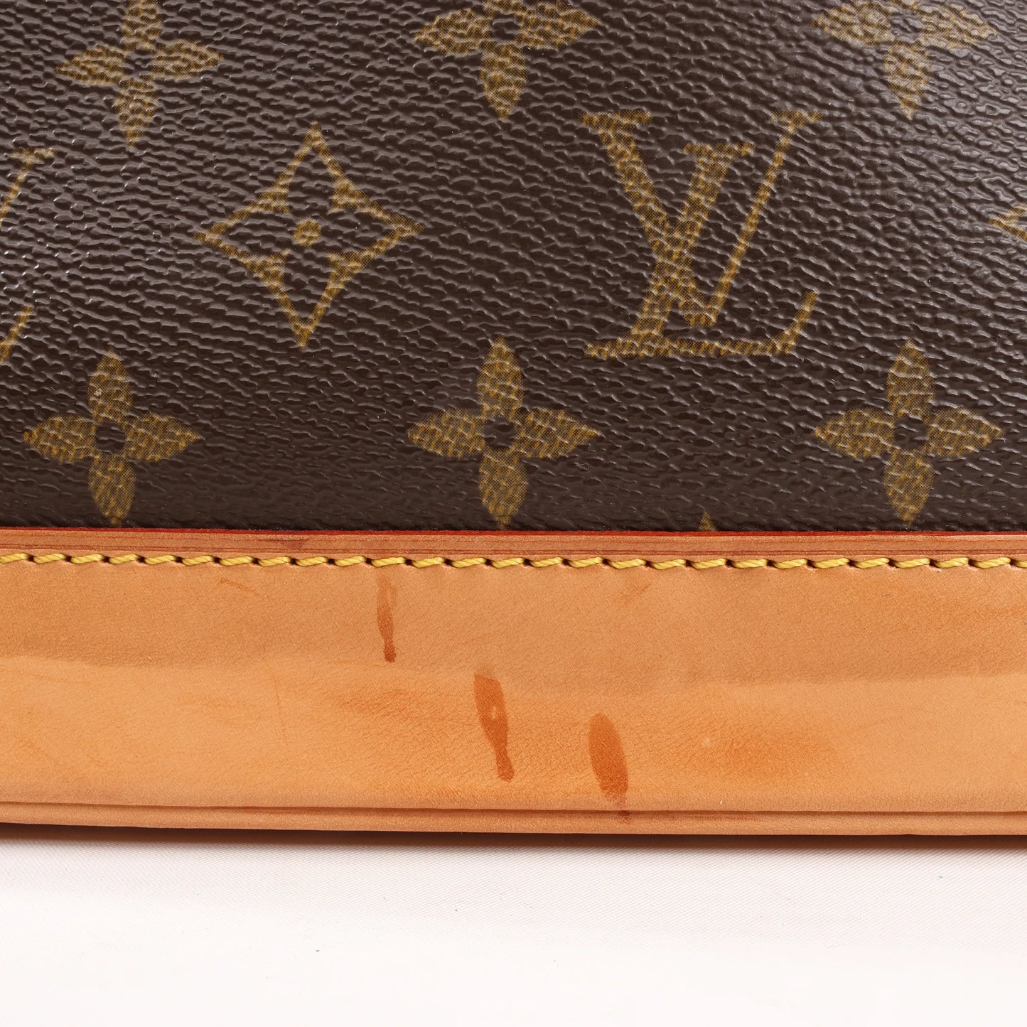 Louis Vuitton Monogram Canvas Alma PM Handbag in Brown M51130