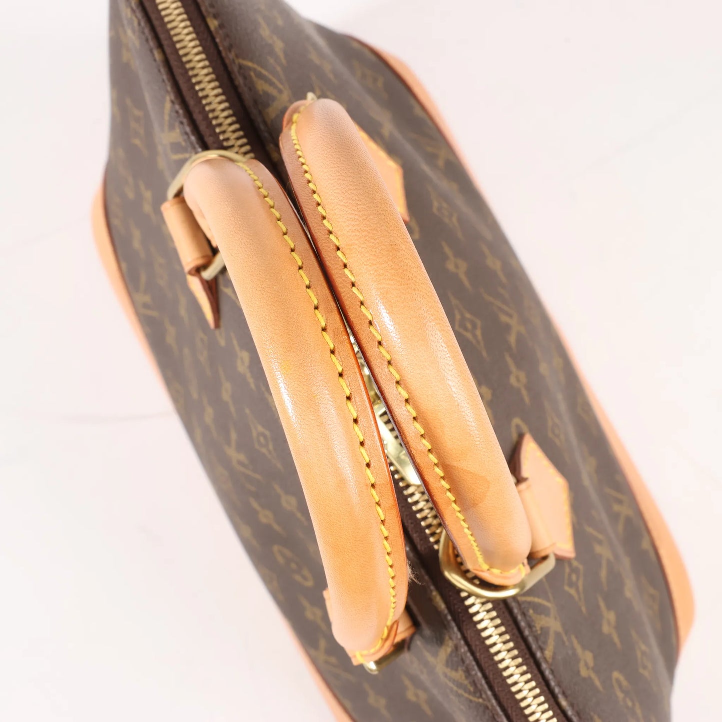 Louis Vuitton Monogram Canvas Alma PM Handbag in Brown M51130