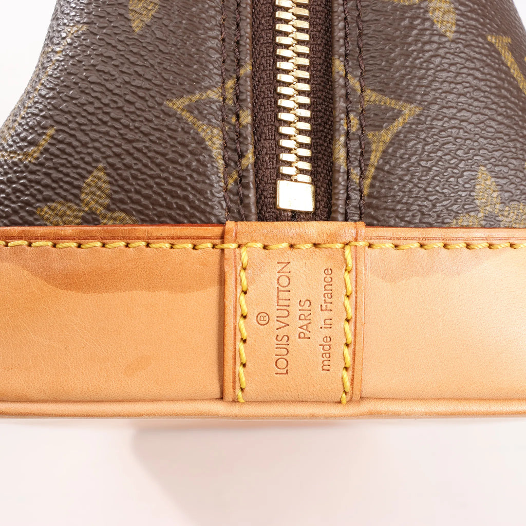Louis Vuitton Monogram Canvas Alma PM Handbag in Brown M51130