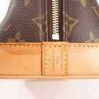 Louis Vuitton Monogram Canvas Alma PM Handbag in Brown M51130