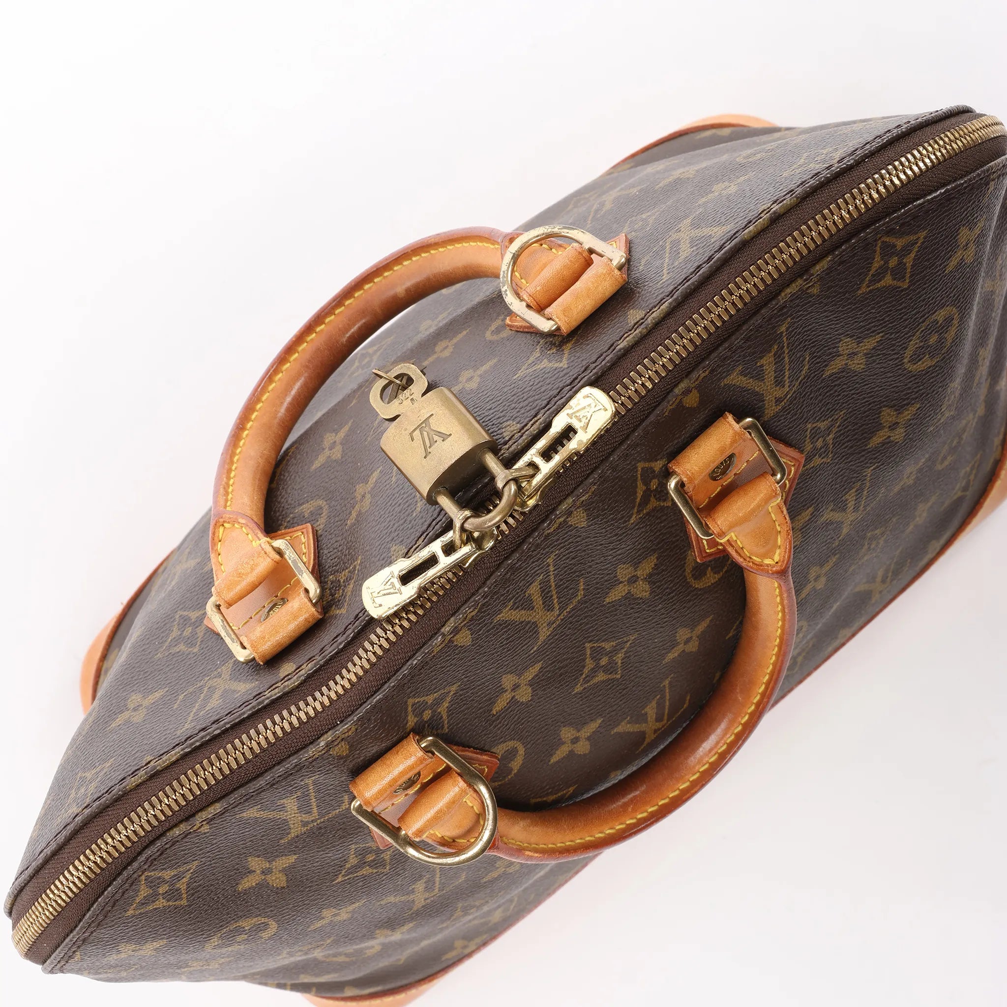 Louis Vuitton Alma PM Monogram Canvas Handbag in Brown M51130