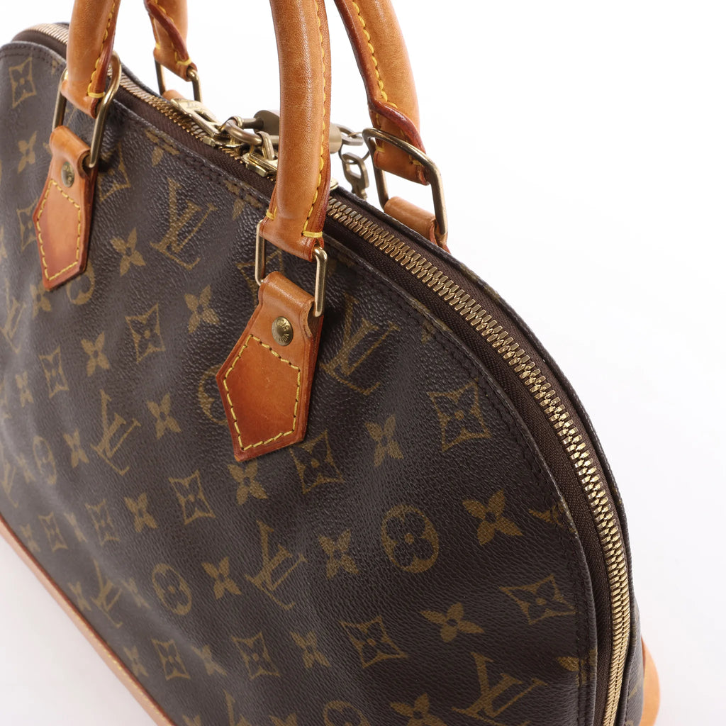 Louis Vuitton Alma PM Monogram Canvas Handbag in Brown M51130