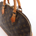 Louis Vuitton Alma PM Monogram Canvas Handbag in Brown M51130
