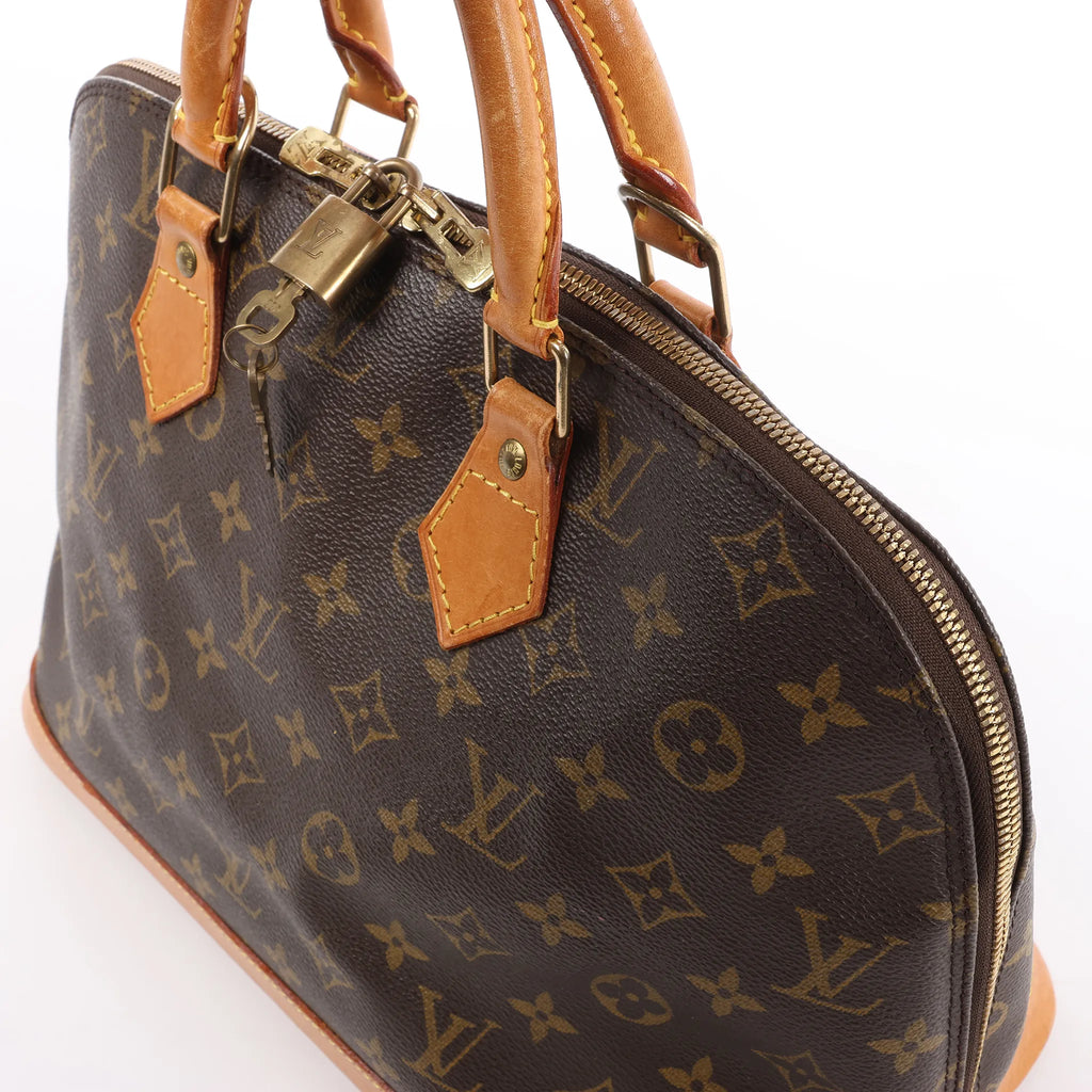 Louis Vuitton Alma PM Monogram Canvas Handbag in Brown M51130