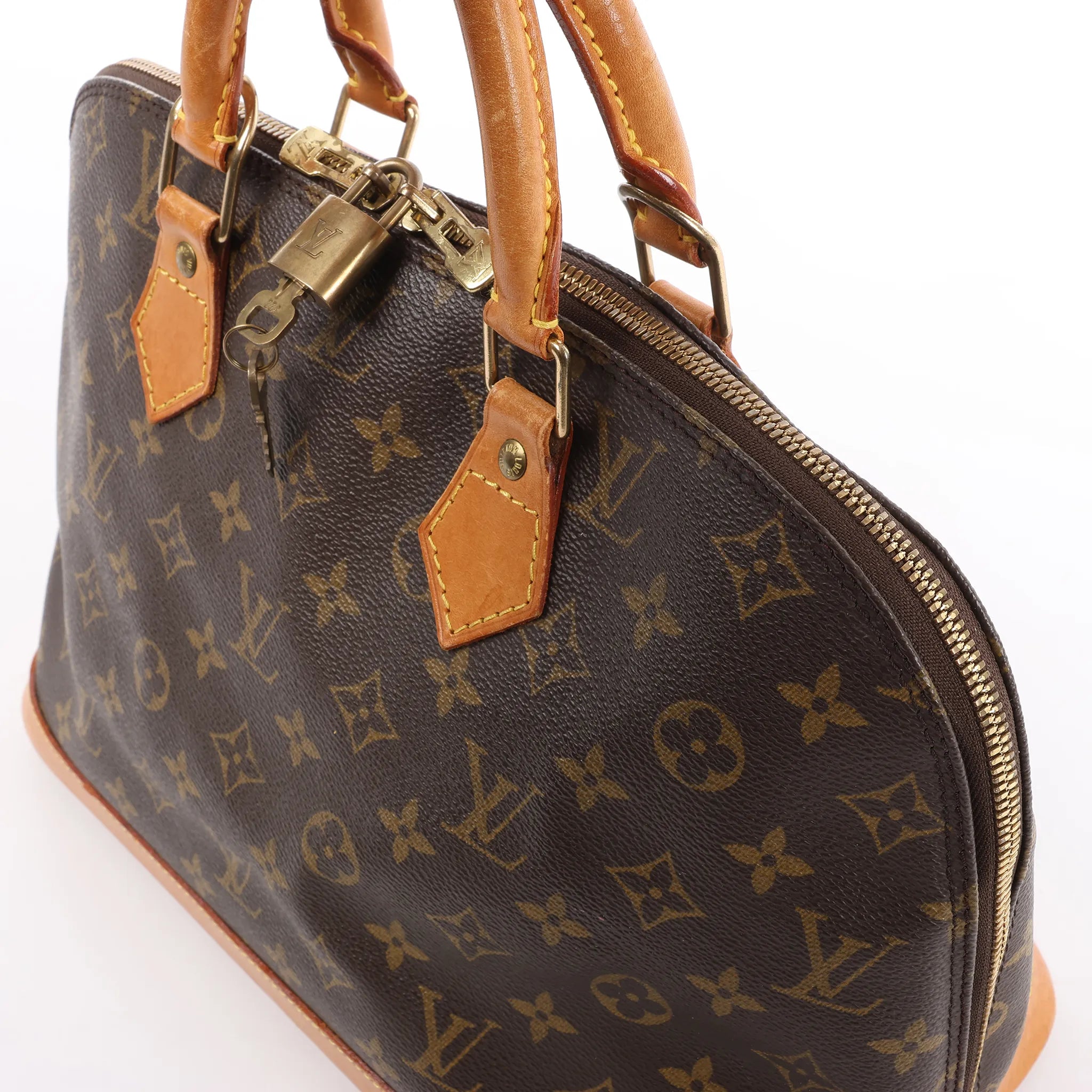 Louis Vuitton Alma PM Monogram Canvas Handbag in Brown M51130