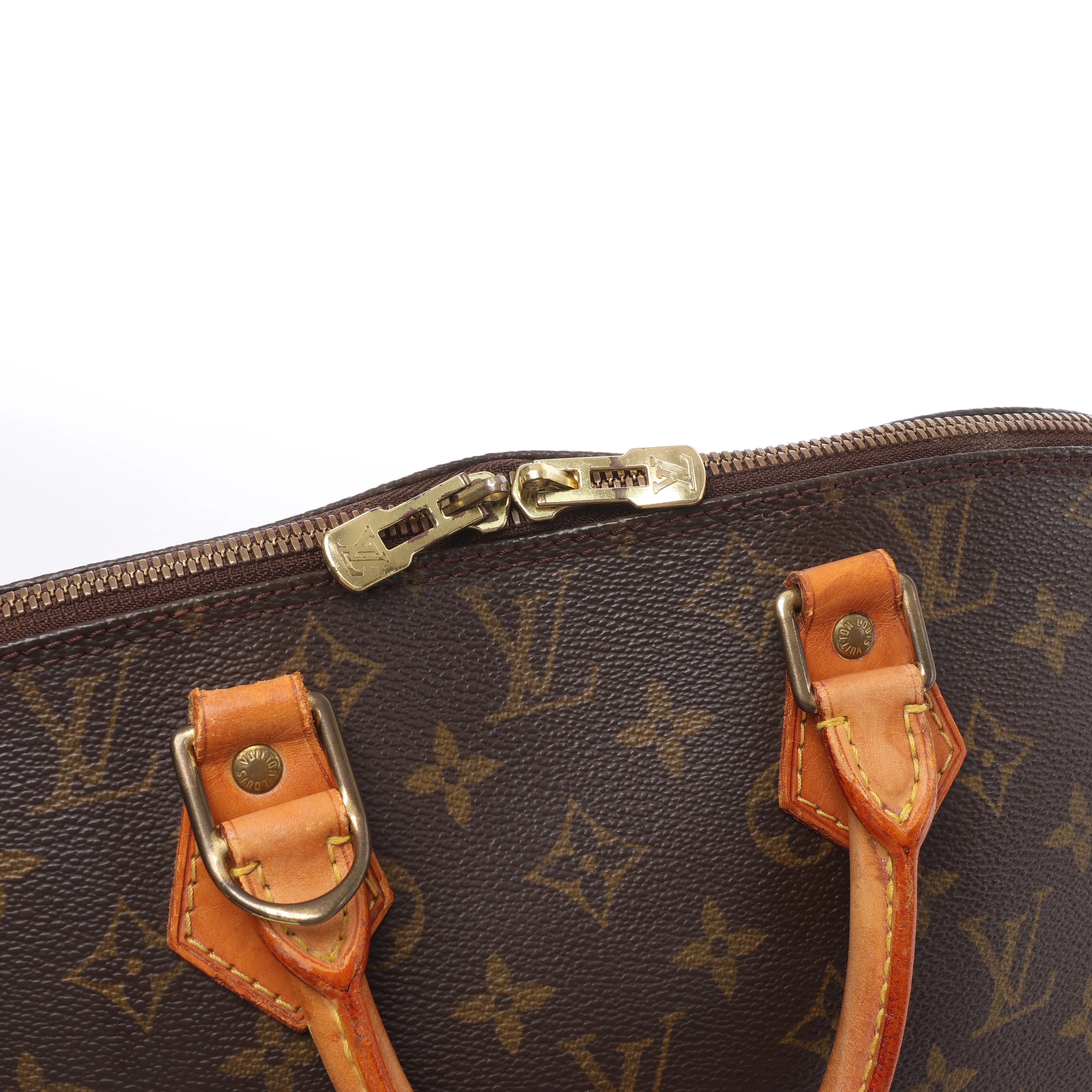 Louis Vuitton Alma Monogram Canvas Handbag in Brown M51130