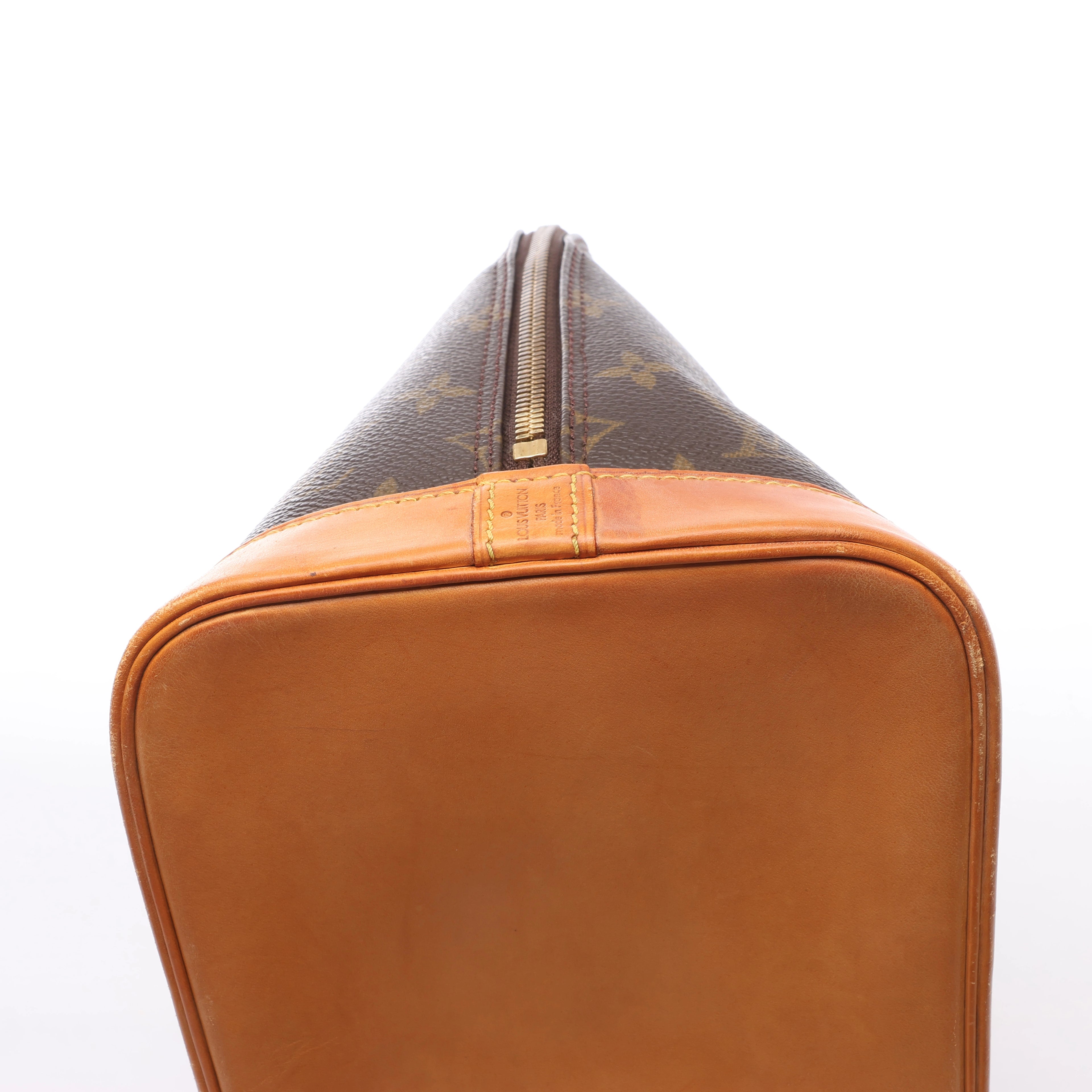 Louis Vuitton Alma Monogram Canvas Handbag in Brown M51130