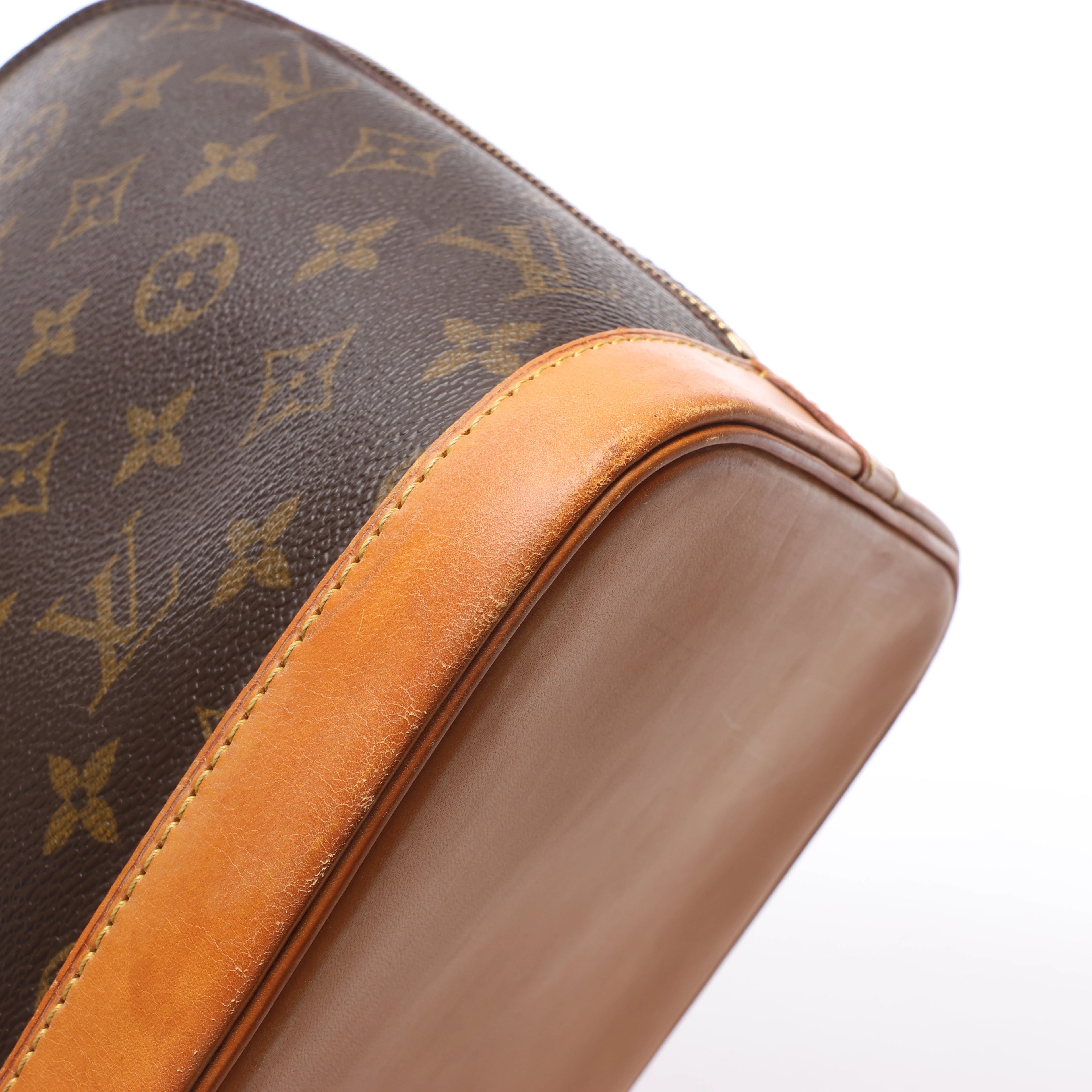 Louis Vuitton Alma Monogram Canvas Handbag in Brown M51130