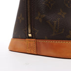 Louis Vuitton Alma Monogram Canvas Handbag in Brown M51130
