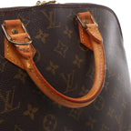 Louis Vuitton Alma Monogram Canvas Handbag in Brown M51130