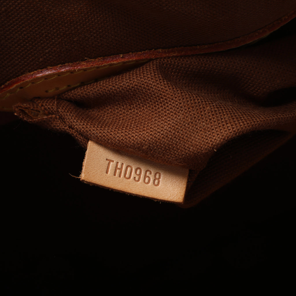 Louis Vuitton Alma Monogram Canvas Handbag in Brown M51130