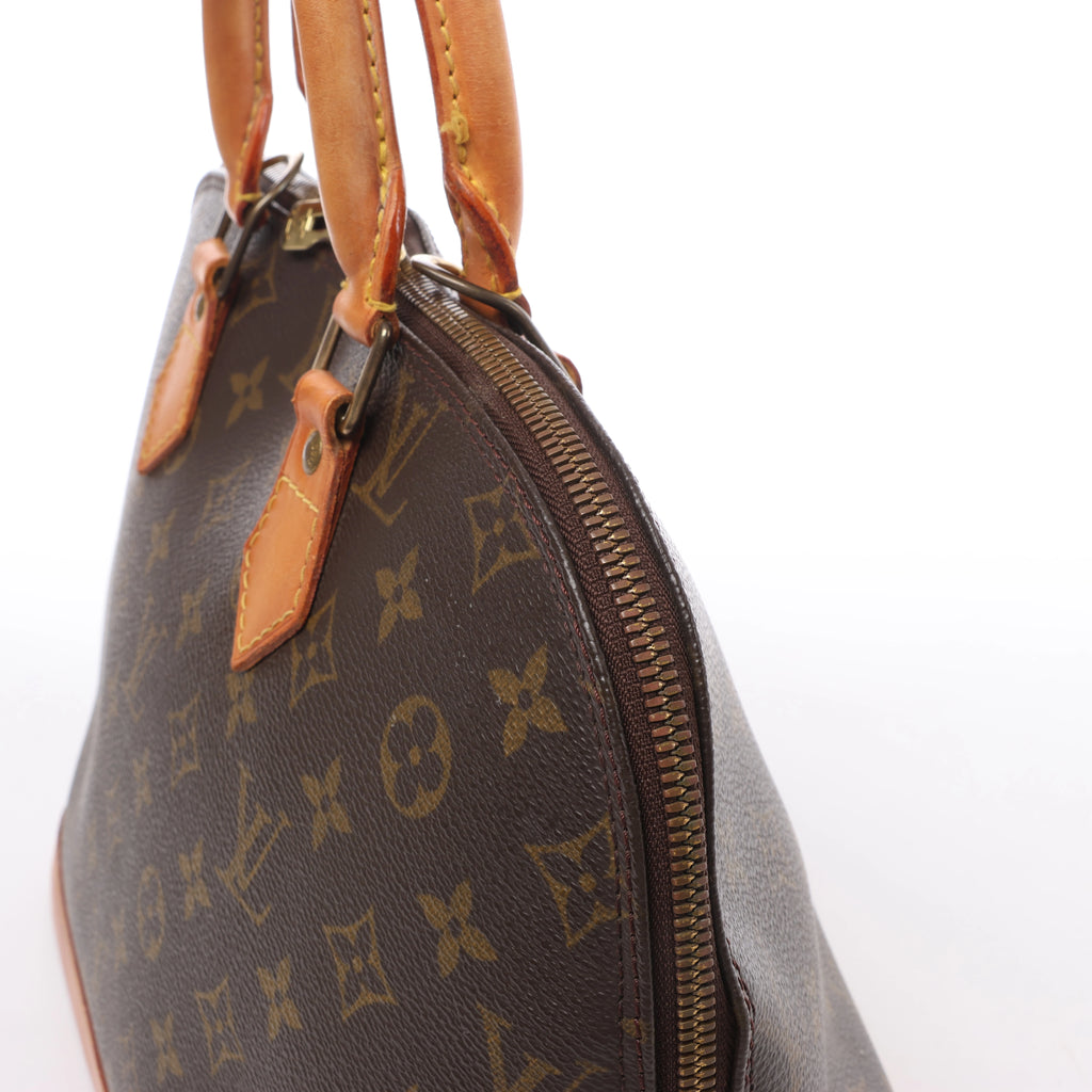 Louis Vuitton Alma Monogram Canvas Handbag in Brown M51130
