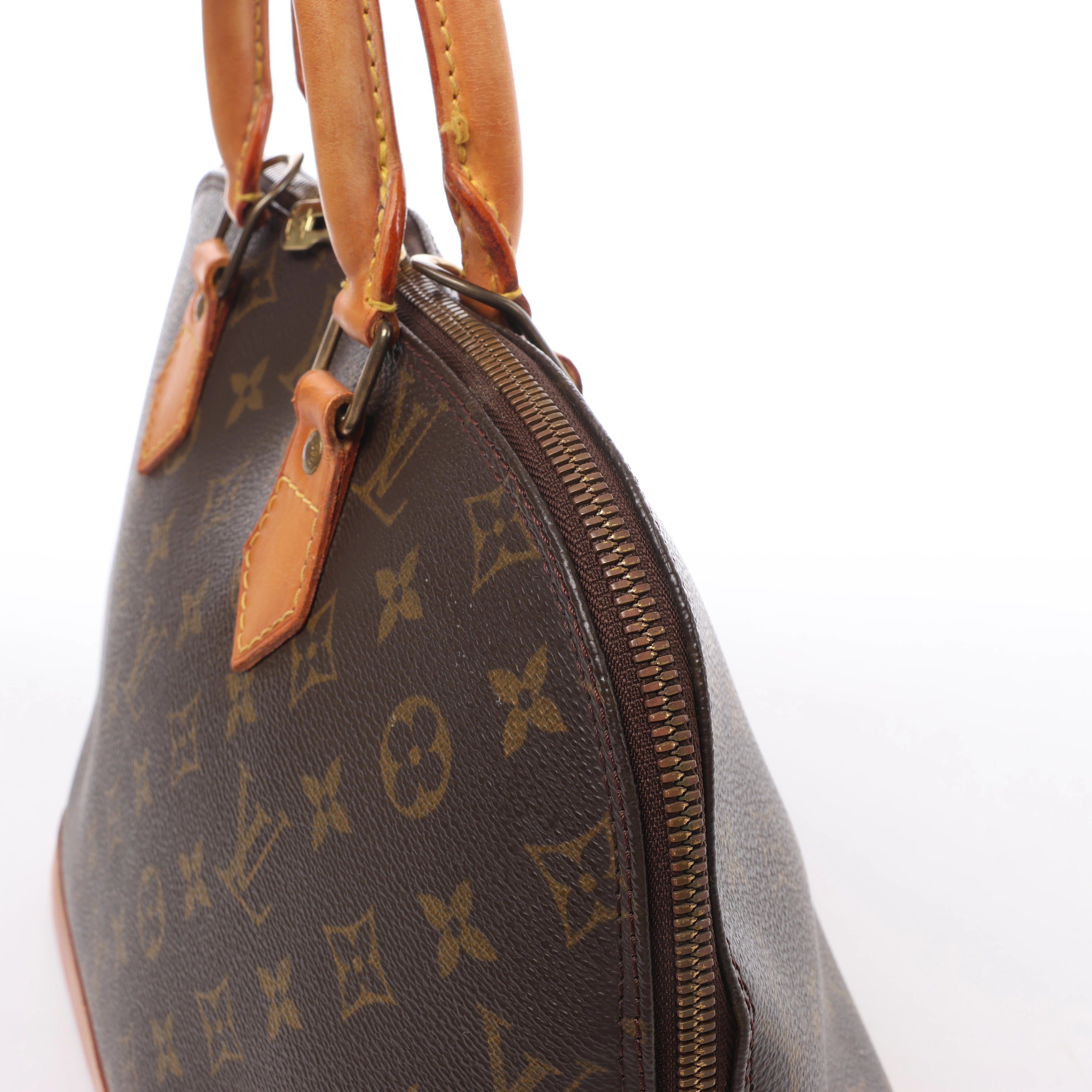 Louis Vuitton Alma Monogram Canvas Handbag in Brown M51130
