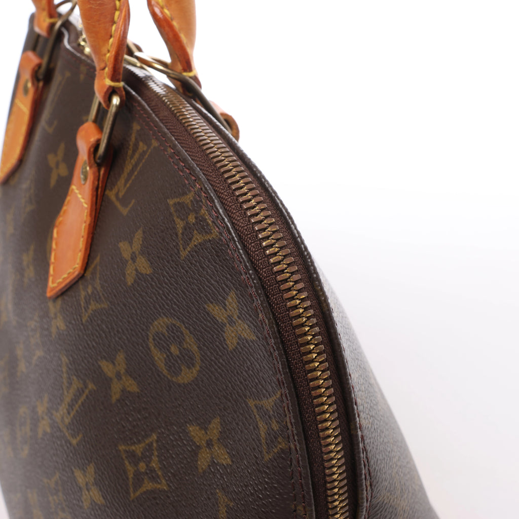Louis Vuitton Alma Monogram Canvas Handbag in Brown M51130