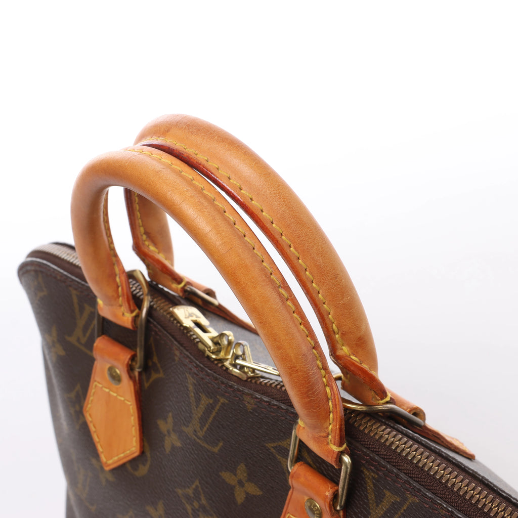 Louis Vuitton Alma Monogram Canvas Handbag in Brown M51130