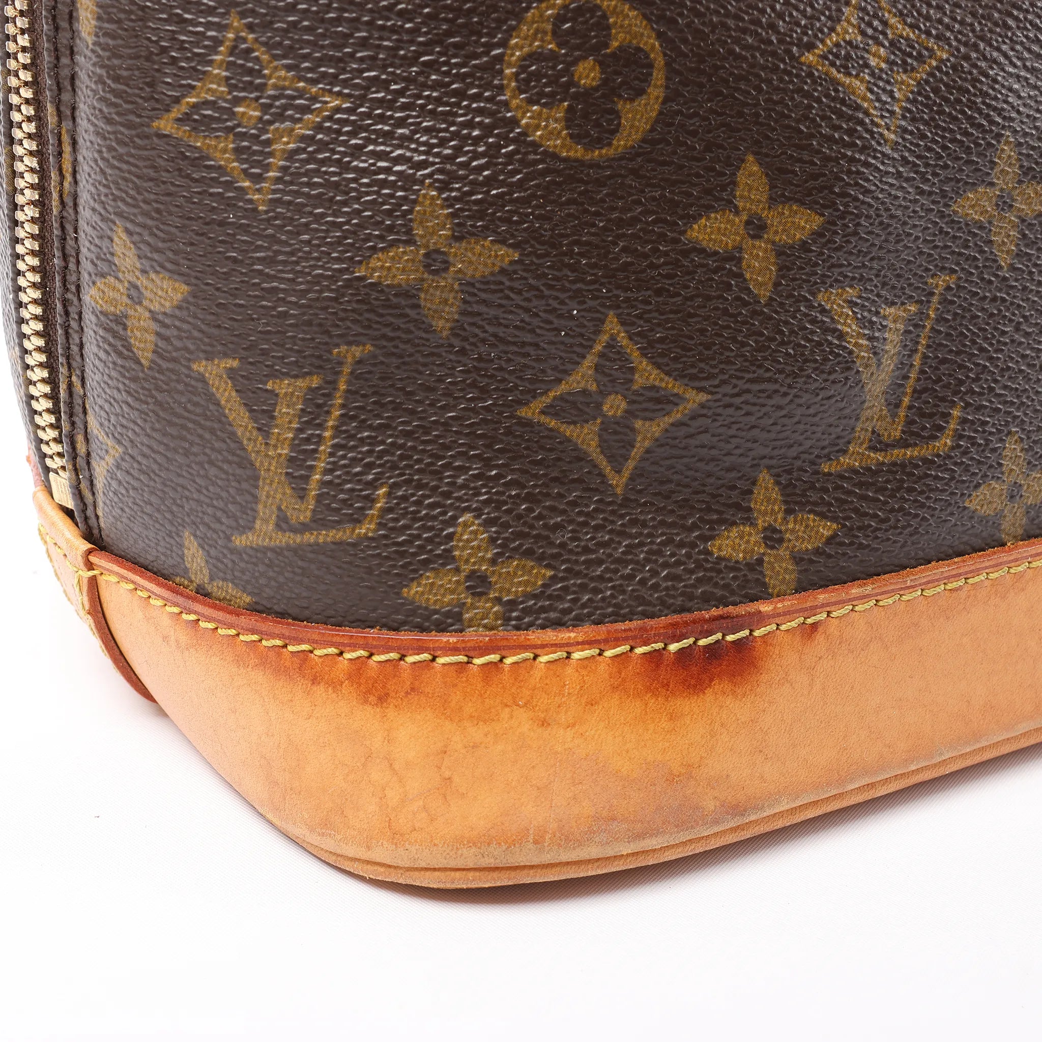 Louis Vuitton Alma PM Monogram Canvas Handbag in Brown M51130