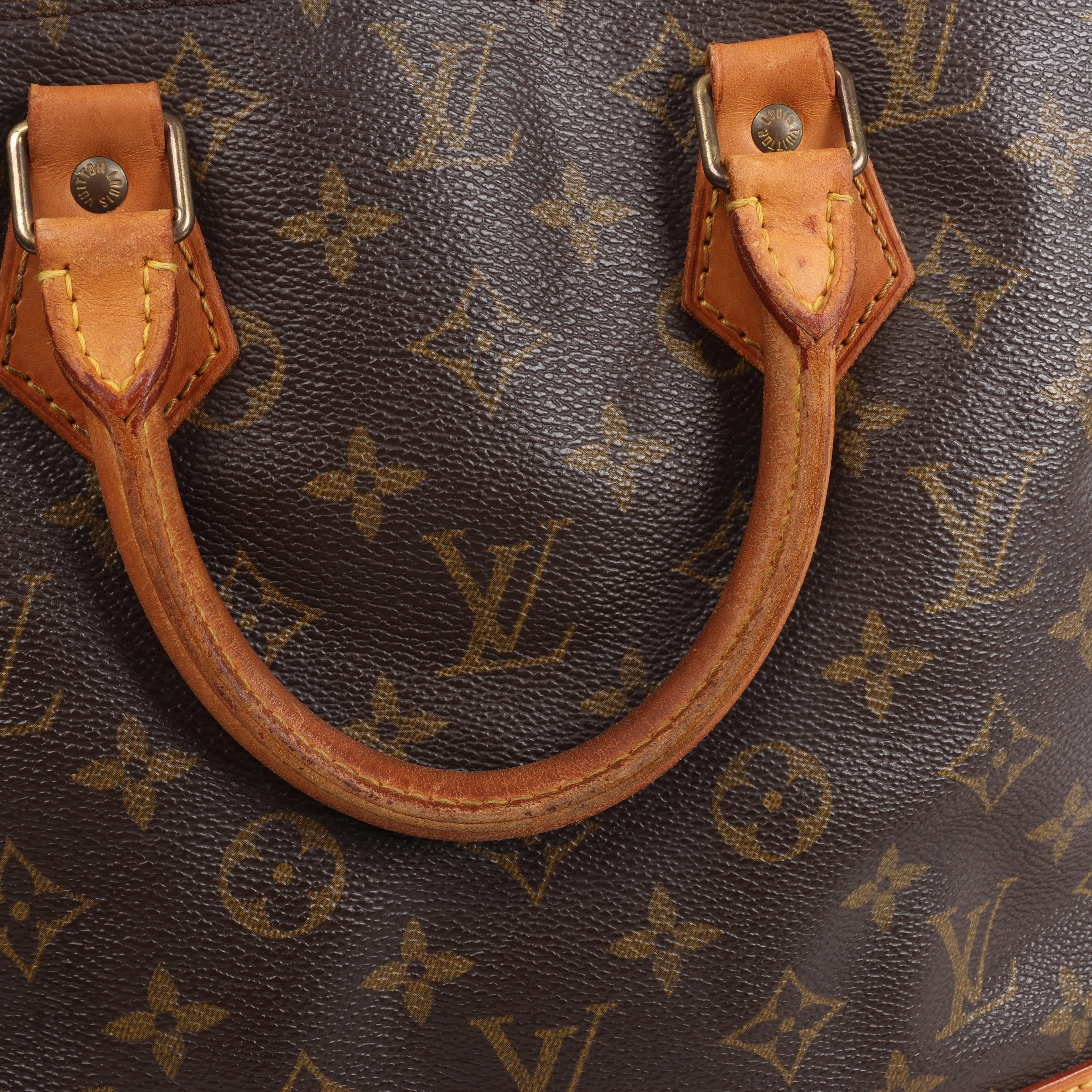 Louis Vuitton Alma PM Monogram Canvas Handbag in Brown M51130