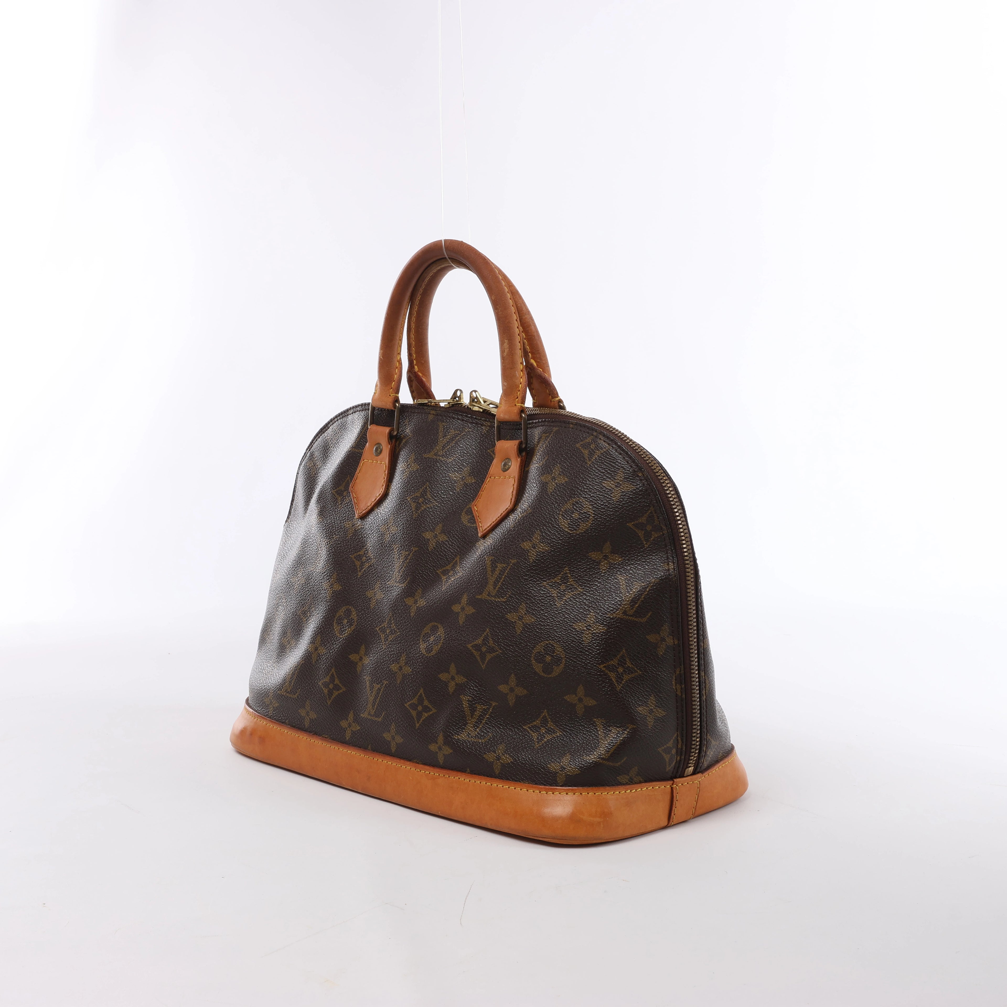 Louis Vuitton Alma PM Monogram Canvas Handbag in Brown M51130