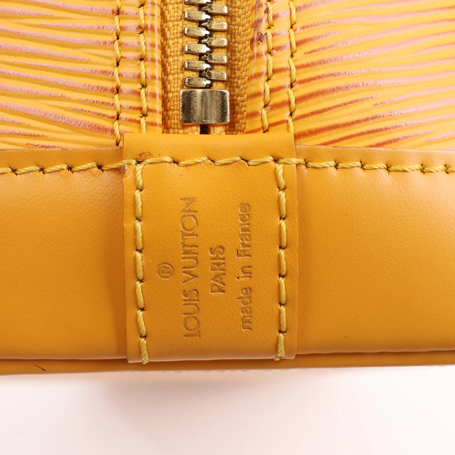 Sac à main Louis Vuitton Alma PM en cuir épi jaune M40619