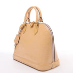 Louis Vuitton Alma PM Vernis Handbag in Beige M90170