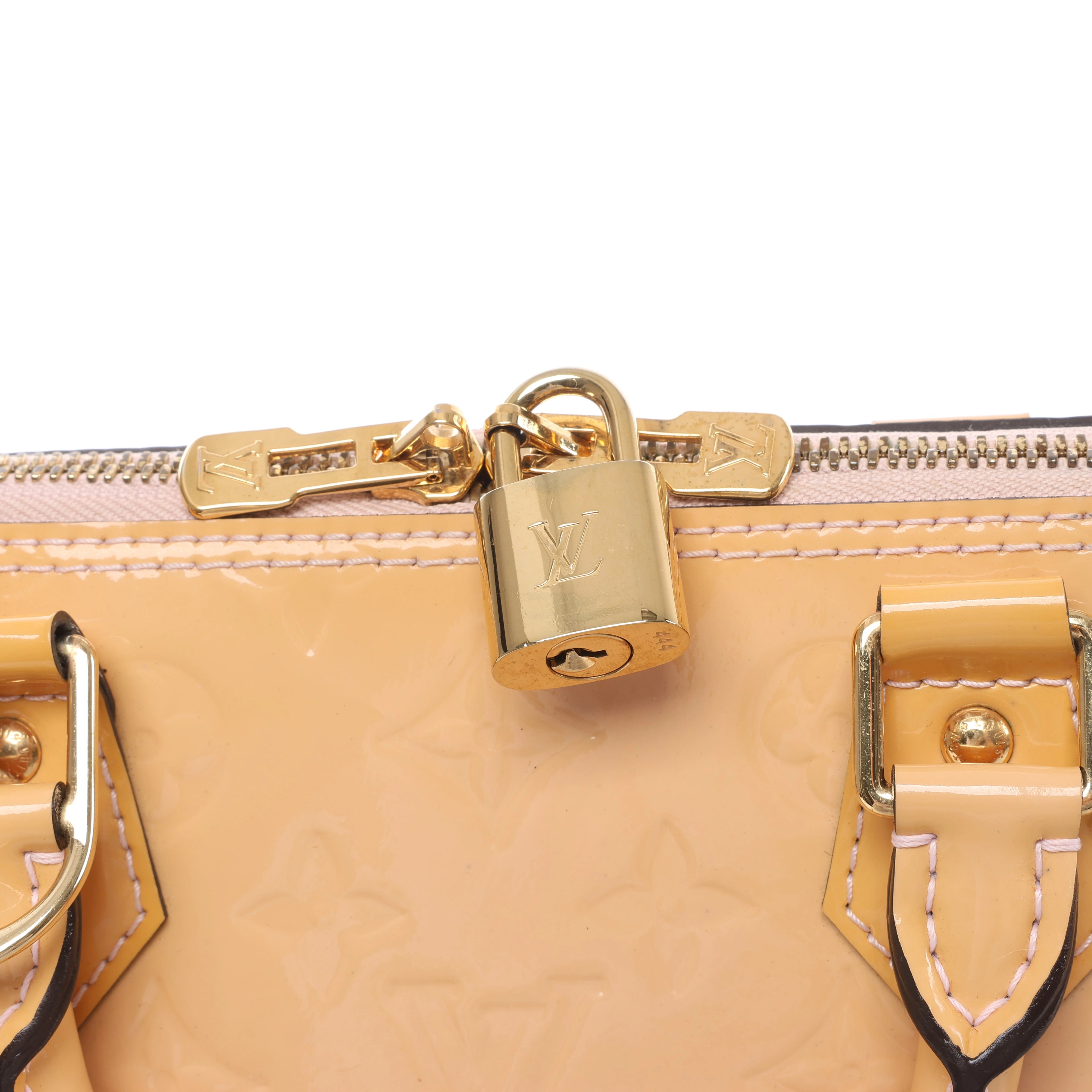 Louis Vuitton Alma PM Vernis Handbag in Beige M90170