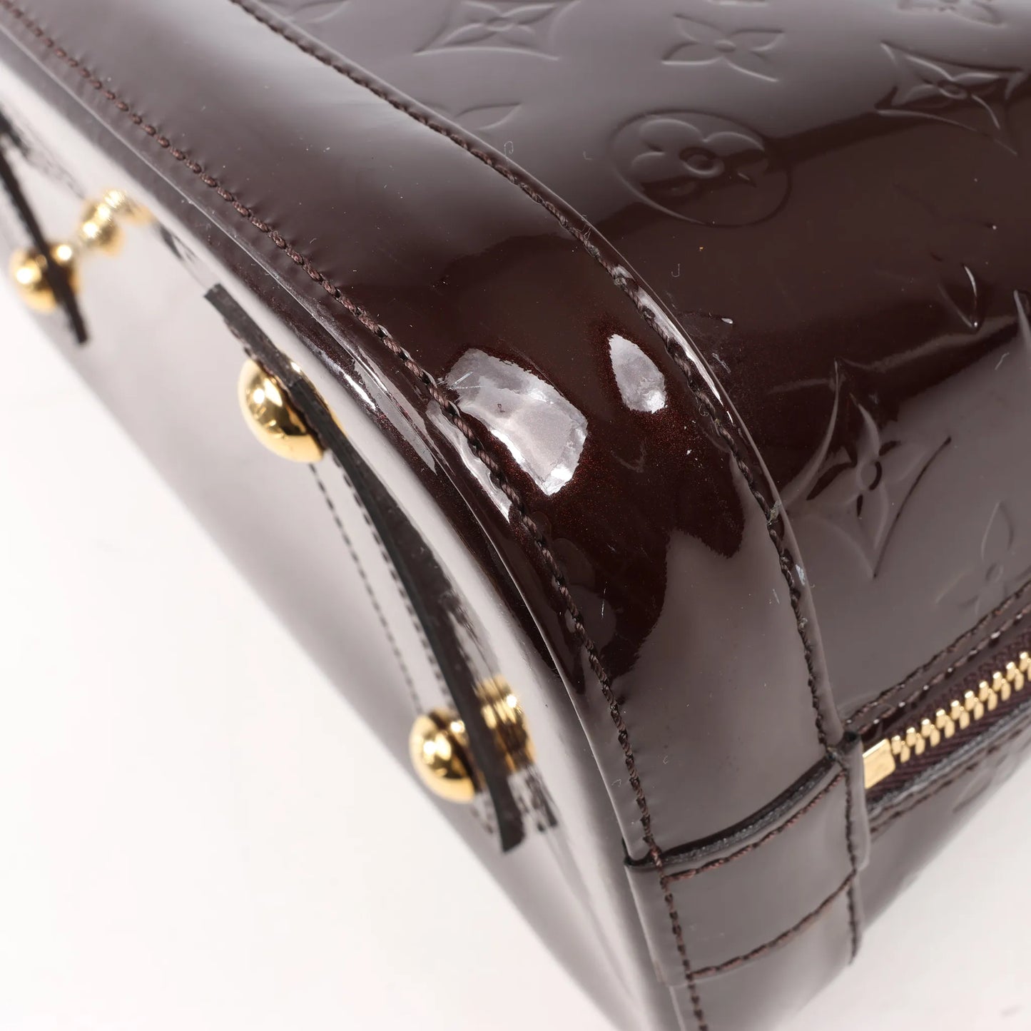 Louis Vuitton Vernis Alma PM Handtasche in Amarante M91611