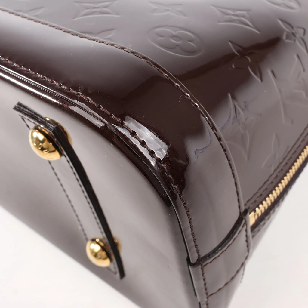 Louis Vuitton Vernis Alma PM Handbag in Amarante M91611