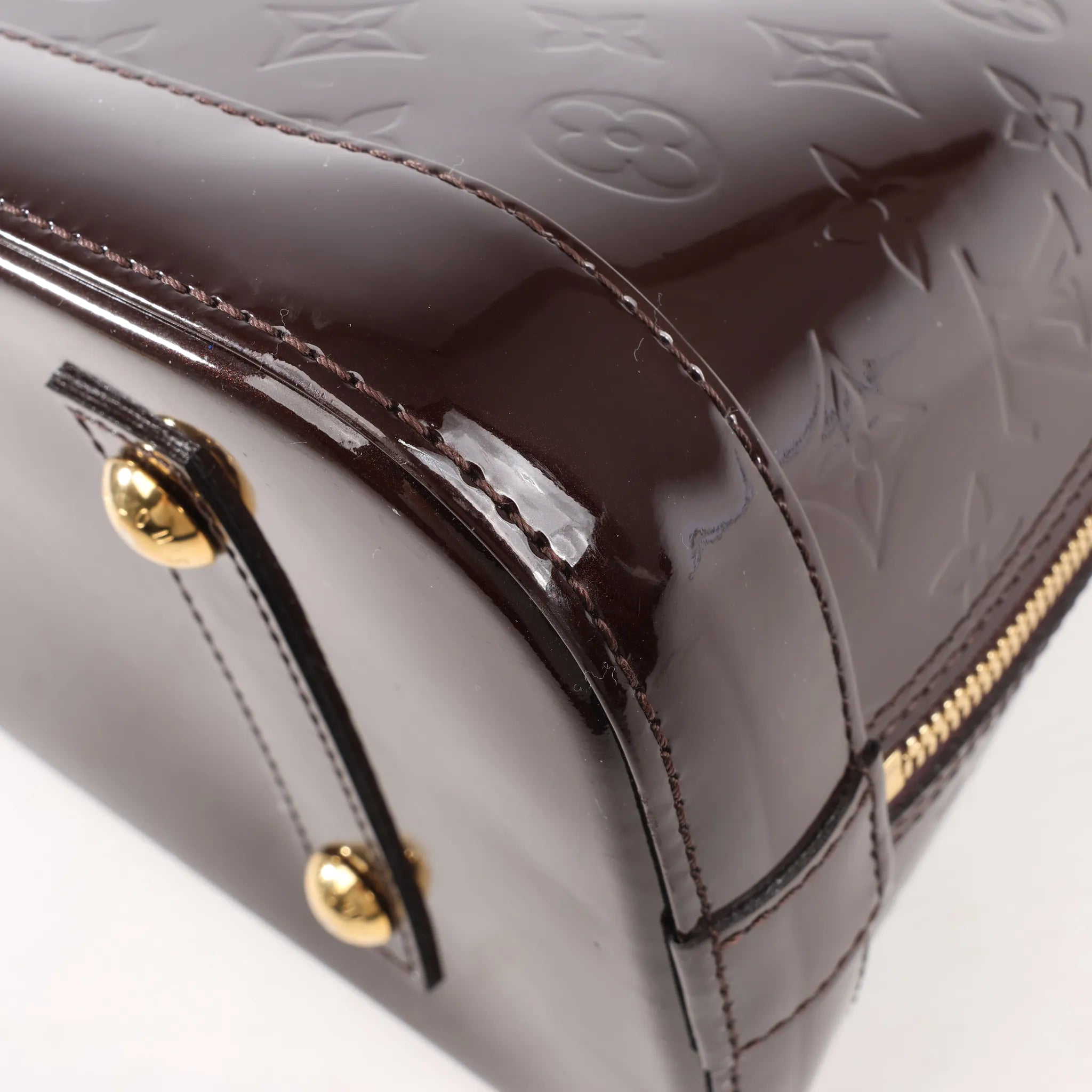 Louis Vuitton Vernis Alma PM Handbag in Amarante M91611