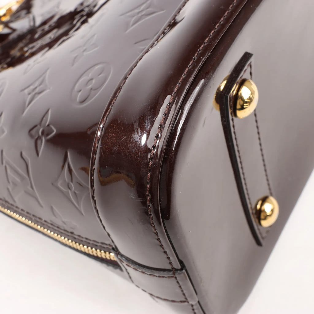 Louis Vuitton Vernis Alma PM Handbag in Amarante M91611