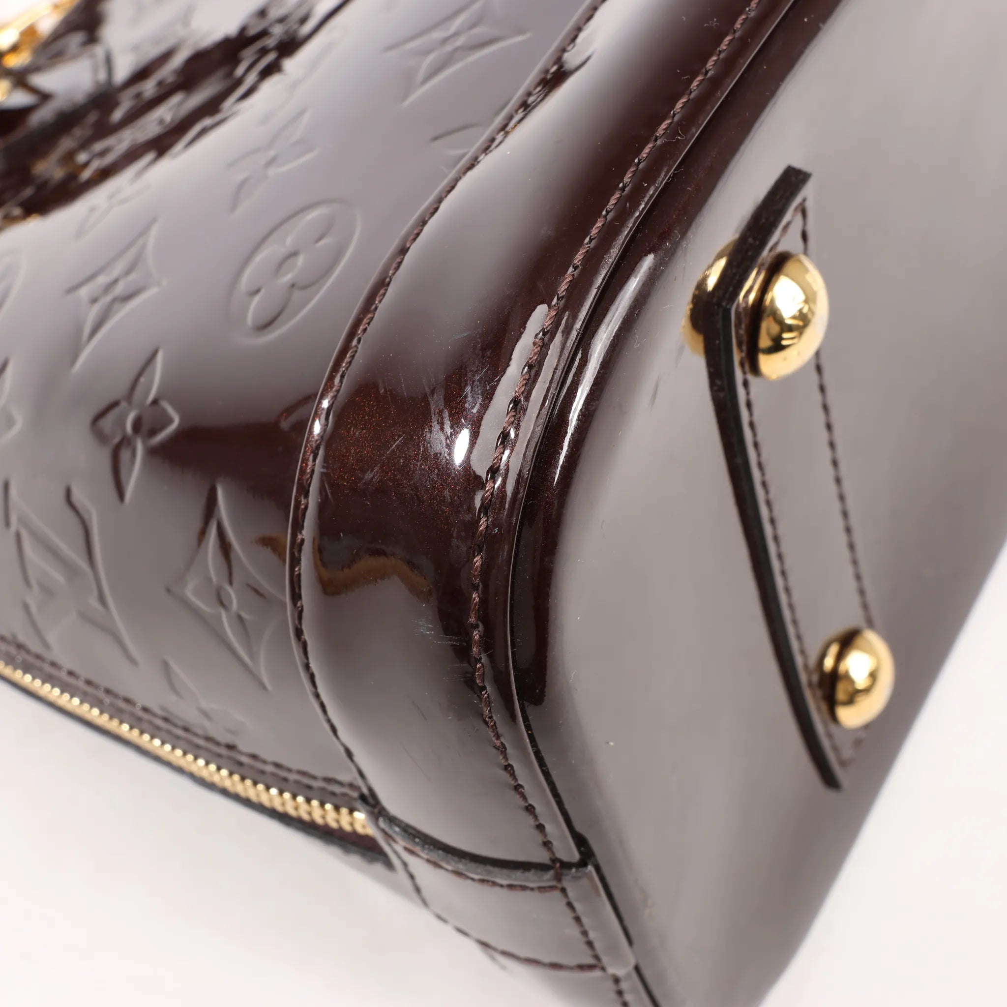 Louis Vuitton Vernis Alma PM Handbag in Amarante M91611