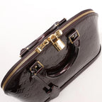Louis Vuitton Vernis Alma PM Handbag in Amarante M91611