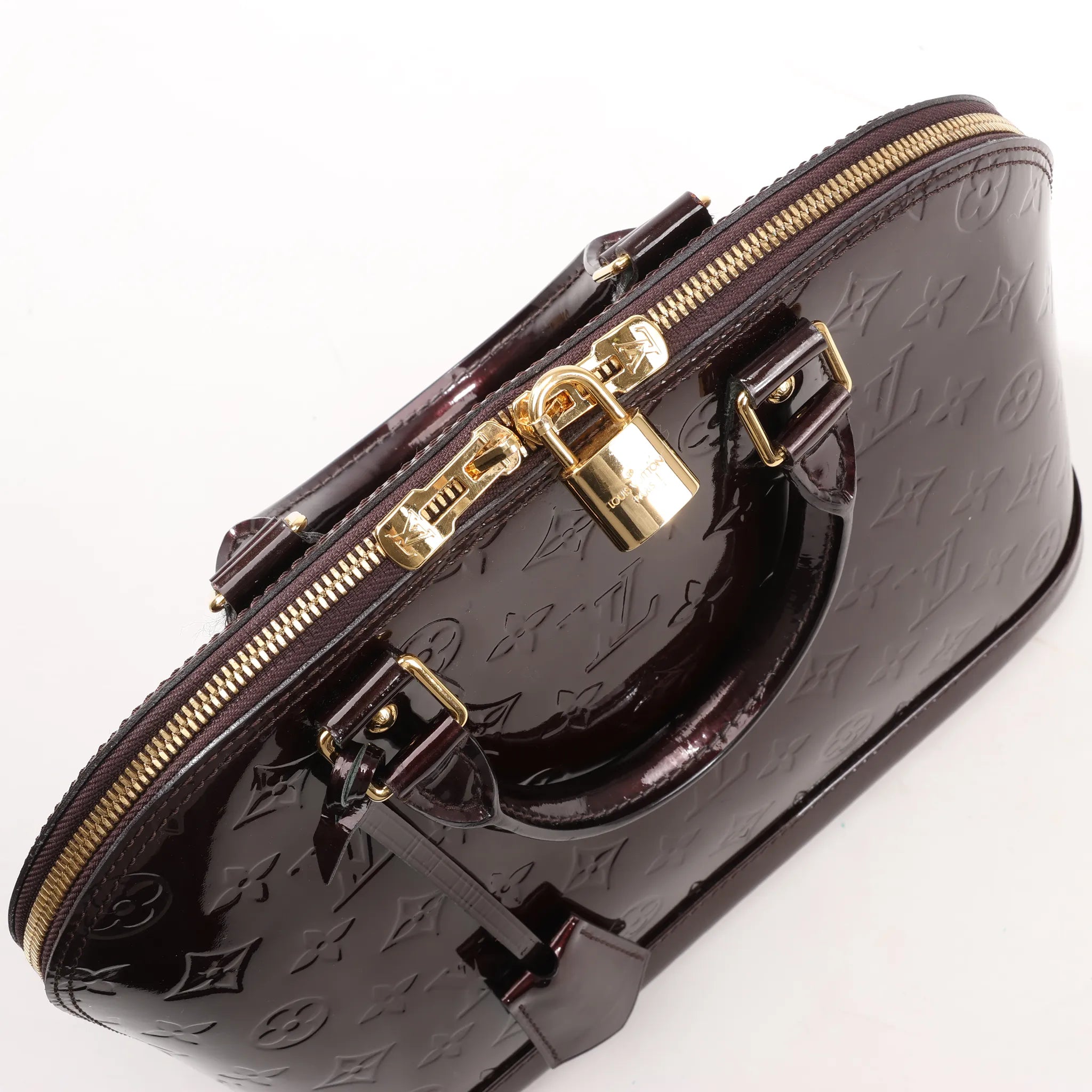 Louis Vuitton Vernis Alma PM Handbag in Amarante M91611