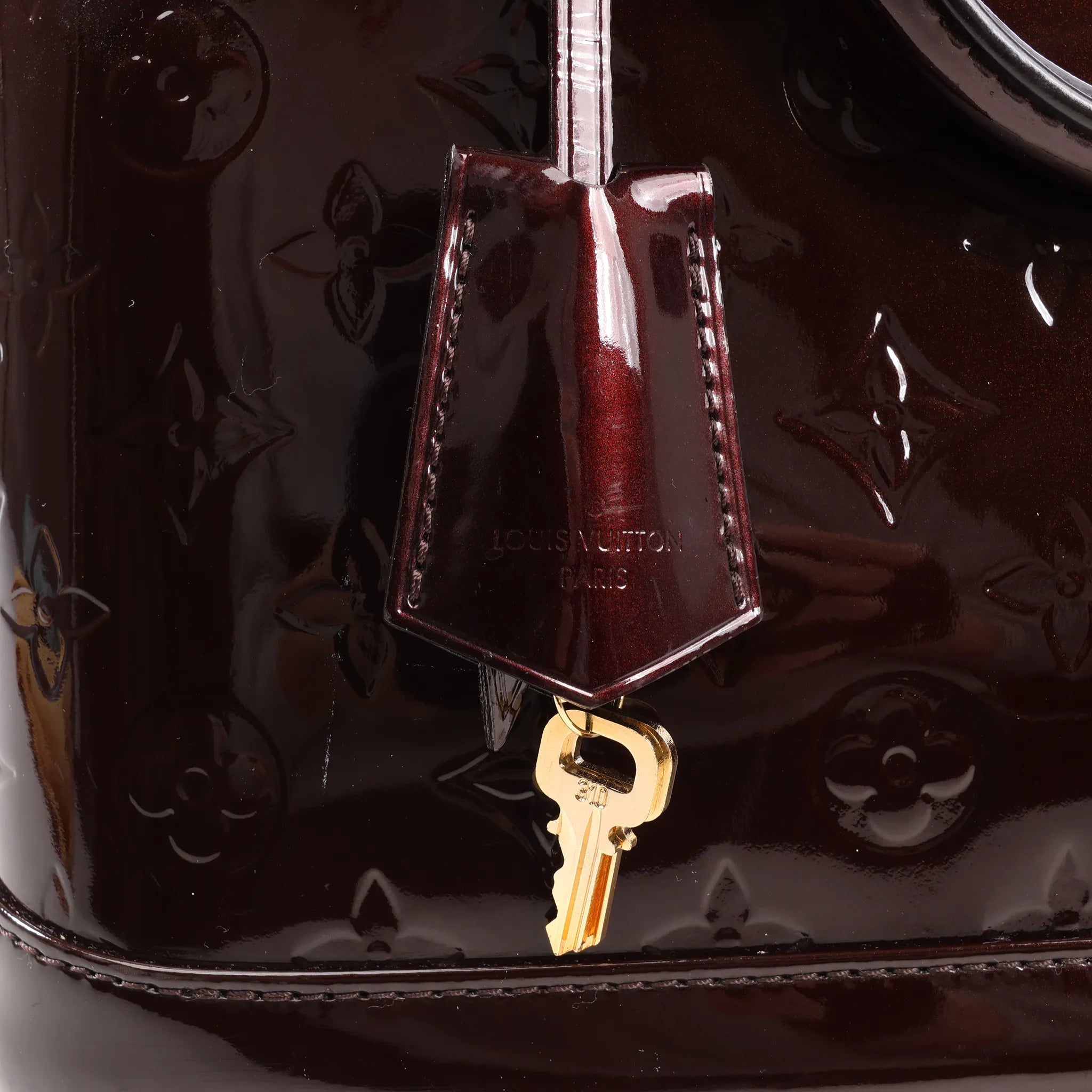 Louis Vuitton Vernis Alma PM Handbag in Amarante M91611