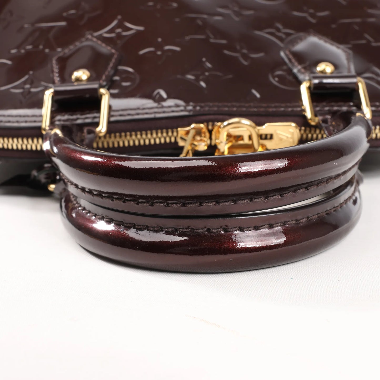 Louis Vuitton Vernis Alma PM Handtasche in Amarante M91611