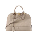 Louis Vuitton Alma PM beige Monogram Empreinte leather handbag with top handles, double zip closure, gold-tone hardware, and detachable shoulder strap on white background
